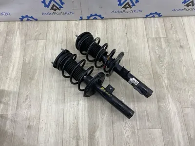 Амортизатор передний Mazda 3 BP PY (б/у)