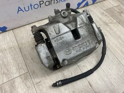 Суппорт тормозной Mazda 3 BP PY перед. лев. (б/у)