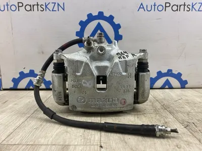 Суппорт тормозной Mazda 3 BP РЕ перед. прав. (б/у)
