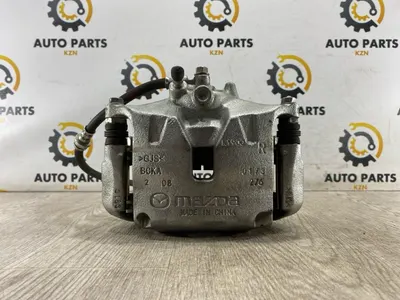 Суппорт тормозной Mazda 3 BP РЕ 2023 перед. прав. (б/у)
