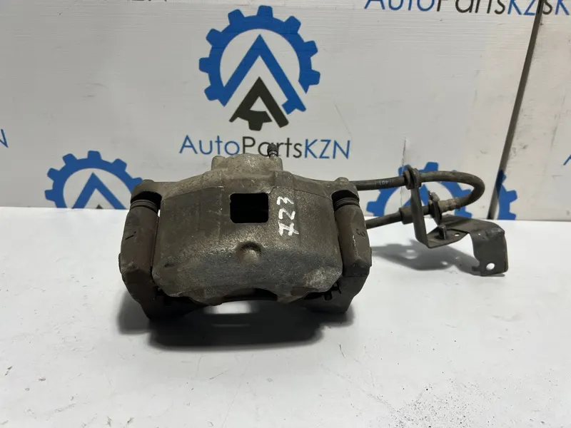Суппорт тормозной Mitsubishi Outlander 3 4J11 перед. лев. (б/у)