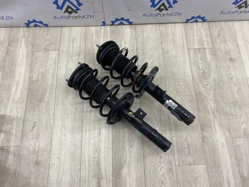Амортизатор передний Mazda 3 BP PY (б/у)