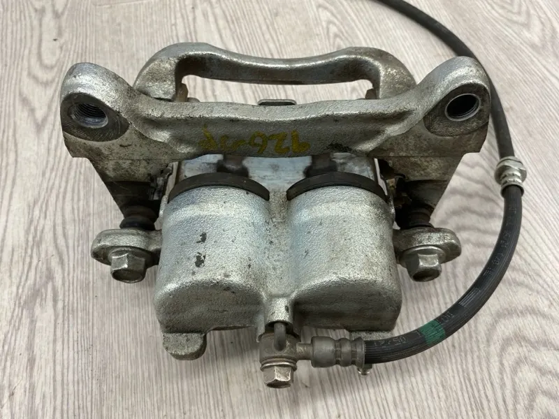 Суппорт тормозной Mazda CX-9 TC PY 2021 перед. лев. (б/у)