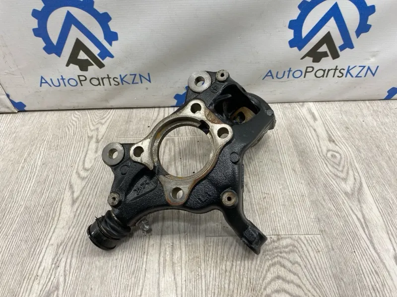 Кулак поворотный Mazda 3 BP перед. лев. (б/у)