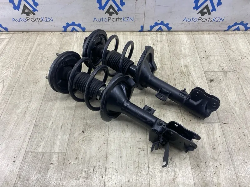 Амортизатор Mitsubishi Outlander XL 2.0 4B11 перед. (б/у)